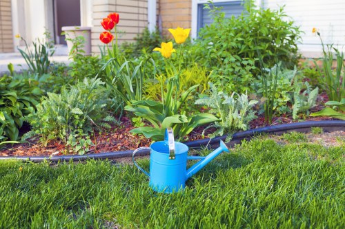 Backyard landscape focal point with patio and greenery in Morden
