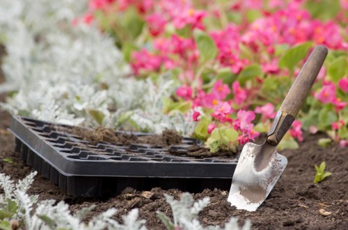Worker using protective equipment during outdoor landscaping